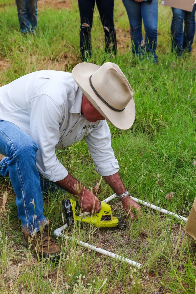 Col Paton, EcoRich grazing cuts a quadrat of pasture from which total standing dry matter per hectare can be calculated.