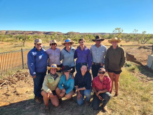 Leadership workshop participants at Yarrie Station, standing in front of an amazing Pilbara backdrop with facilitators Tammy Kruckow and Steve Burke