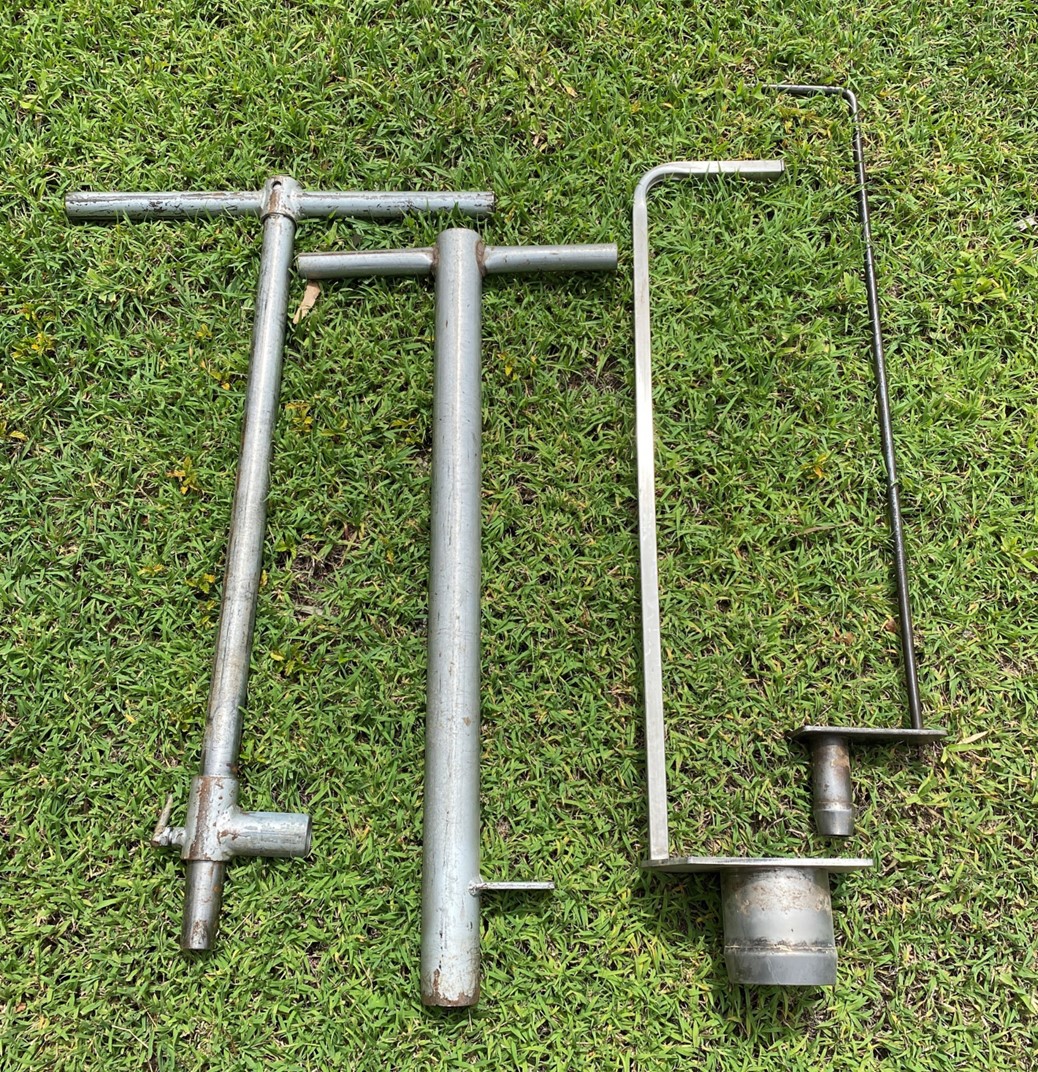 Examples of home-made foot stomp corers built from steel off-cuts of pipe, rod and flat bar.