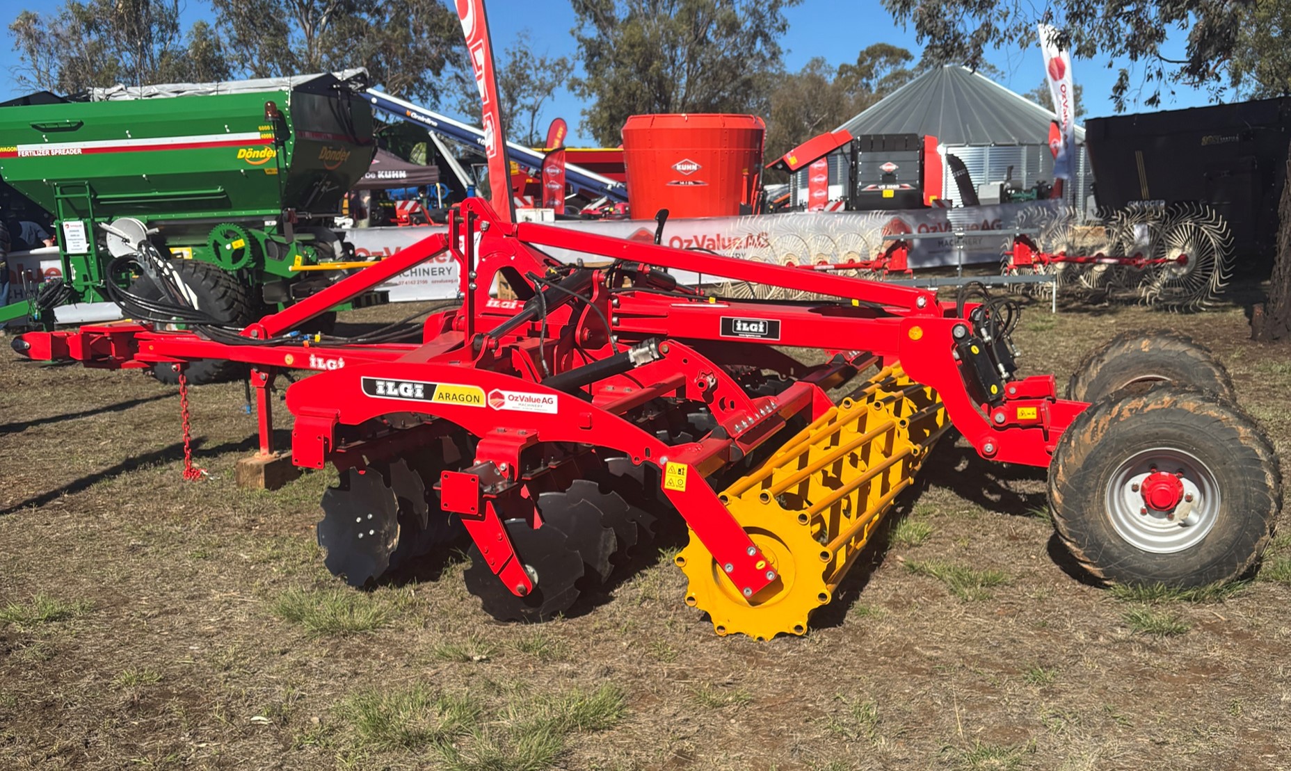 Rede steel framed piece of machinery that is towed behind a tractor. Frame holds 2 rows of concave plough discs followed by a roller.