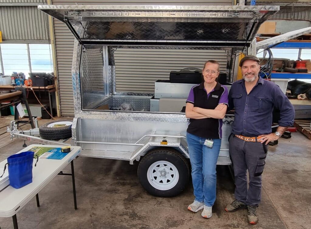 Mobile laboratory trailer with designer and engineer